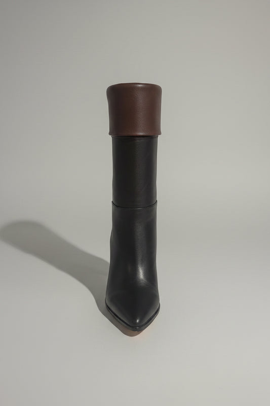 Ne manquez pas cette opportunité d'ajouter une touche de sophistication à votre look. Les bottines à talon Lola Cruz sont plus qu'une simple paire de chaussures; elles sont une affirmation de style et de confiance.