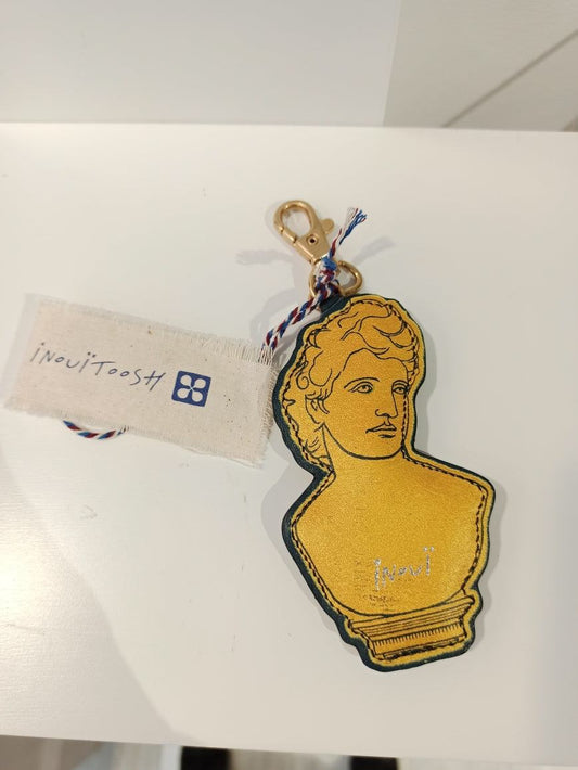 porte clé chance en cuir et tissu avec design buste jaune Inouitoosh